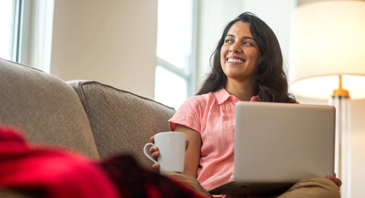 Stock photo of a woman working at home.