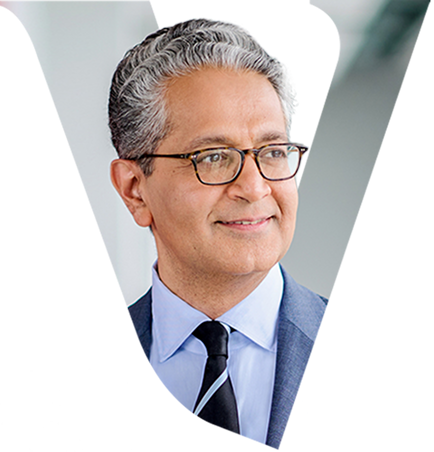 Salim – Vanguard CEO Headshot in Stylized V Frame